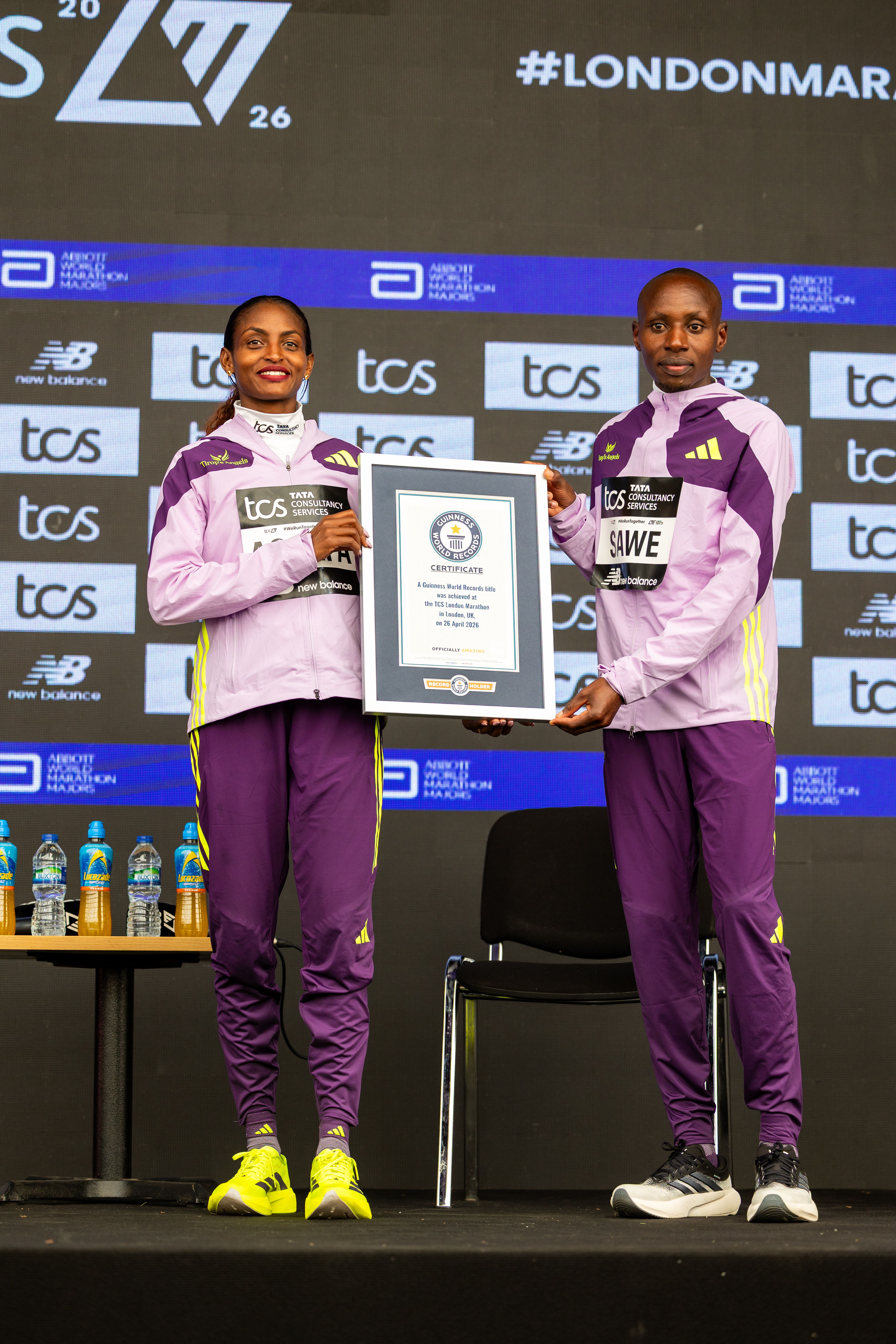 Sabastian Sawe and Tigst Assefa with Guinness World Record certificates, TCS London Marathon 2026